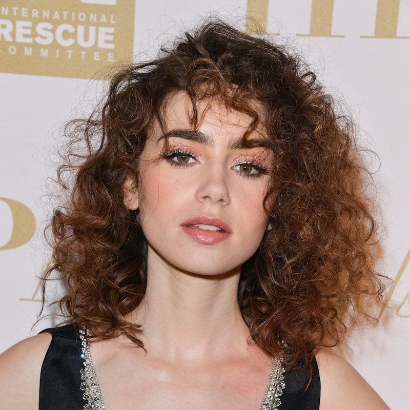 curly Side Part with Bangs